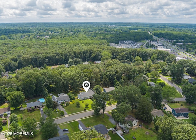10 Locust Grove Ln, Manalapan, NJ 07726 - drone / aerial view of a heavily wooded area