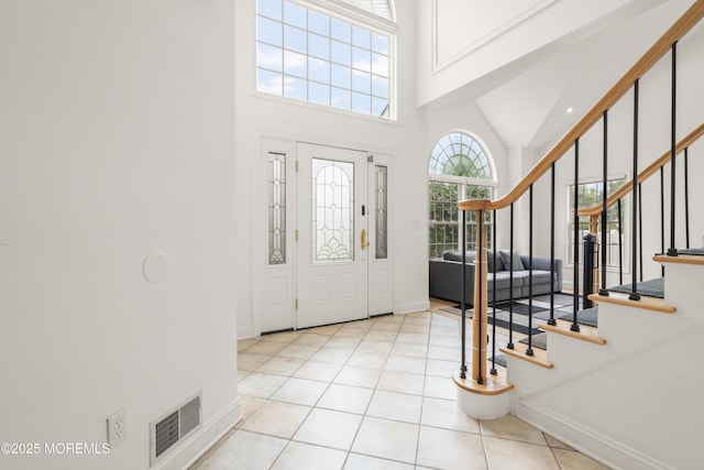 95 Linden Ave, West Long Branch, NJ 07764 - foyer entrance featuring a towering ceiling, stairway, and tile patterned flooring