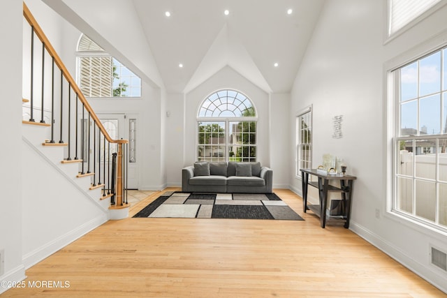 95 Linden Ave, West Long Branch, NJ 07764 - foyer entrance featuring light wood finished floors, stairway, recessed lighting, and high vaulted ceiling