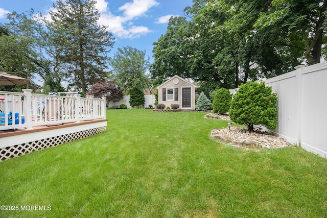 95 Linden Ave, West Long Branch, NJ 07764 - fenced backyard featuring an outdoor structure and a wooden deck