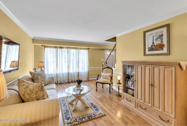 8 Yellowstone Ln, Howell, NJ 07731 - living area featuring ornamental molding, light wood finished floors, and stairway