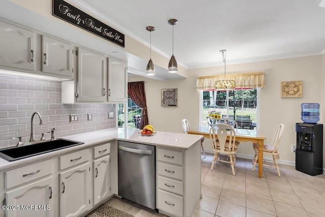 8 Yellowstone Ln, Howell, NJ 07731 - kitchen featuring stainless steel dishwasher, ornamental molding, a peninsula, tasteful backsplash, and white cabinetry