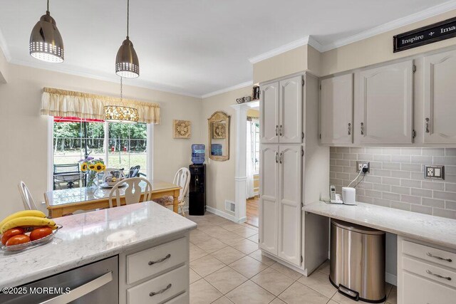 8 Yellowstone Ln, Howell, NJ 07731 - kitchen featuring white cabinets, tasteful backsplash, crown molding, hanging light fixtures, and light stone counters