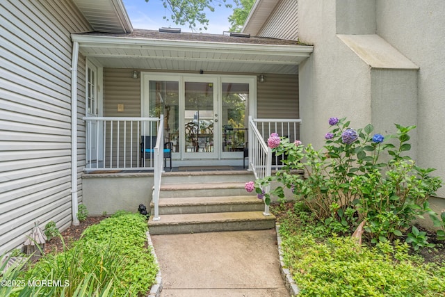 7 Wallace Ave, Oakhurst, NJ 07755 - property entrance featuring stucco siding and french doors