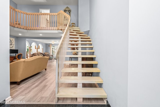 7 Wallace Ave, Oakhurst, NJ 07755 - stairway with wood finished floors and a high ceiling