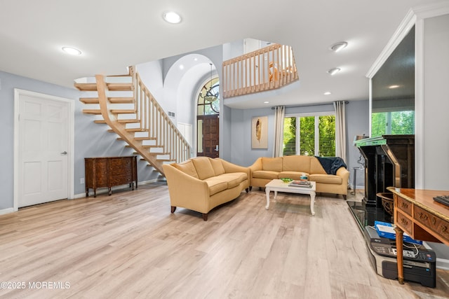 7 Wallace Ave, Oakhurst, NJ 07755 - living area with stairway, light wood finished floors, a fireplace, and recessed lighting
