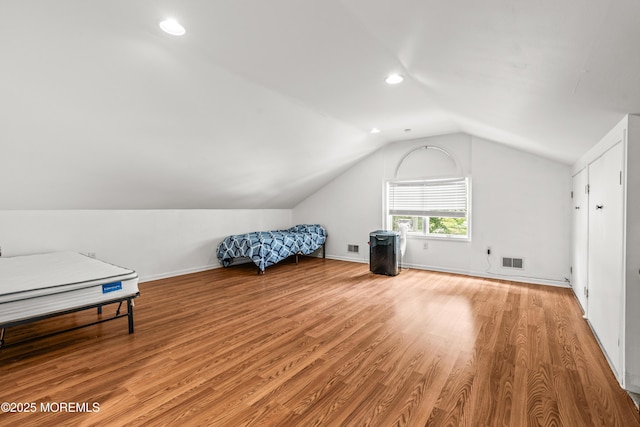 7 Wallace Ave, Oakhurst, NJ 07755 - unfurnished bedroom with vaulted ceiling, light wood-style flooring, and recessed lighting