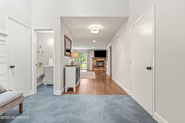 50 Lenape Trl, Tinton Falls, NJ 07724 - hallway with tile patterned flooring and recessed lighting