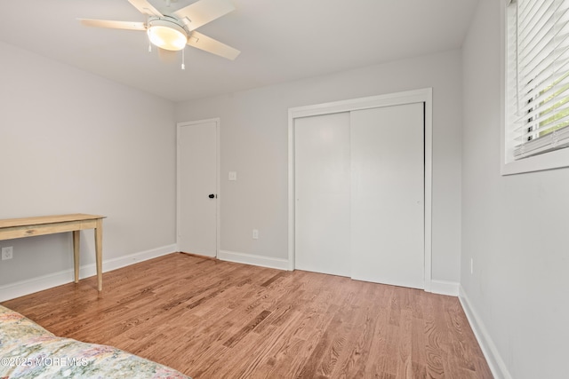 50 Lenape Trl, Tinton Falls, NJ 07724 - unfurnished bedroom with wood finished floors, a closet, and a ceiling fan