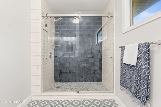 50 Lenape Trl, Tinton Falls, NJ 07724 - bathroom featuring a stall shower and baseboards