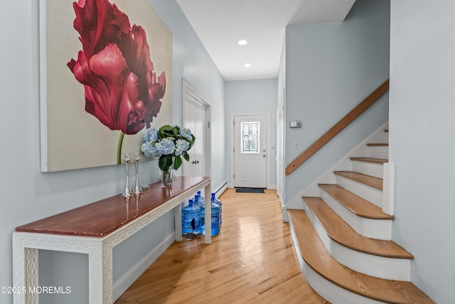 460 Runyan Ave, Deal, NJ 07723 - doorway with wood finished floors, stairs, a baseboard heating unit, and recessed lighting