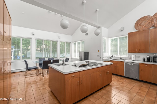 460 Runyan Ave, Deal, NJ 07723 - kitchen featuring stainless steel dishwasher, electric cooktop, high vaulted ceiling, a center island with sink, and light tile patterned floors