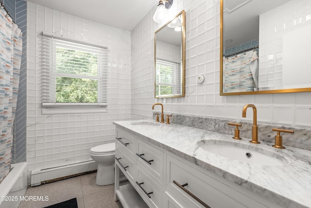 460 Runyan Ave, Deal, NJ 07723 - bathroom with a baseboard heating unit, tile walls, double vanity, and shower / bath combo