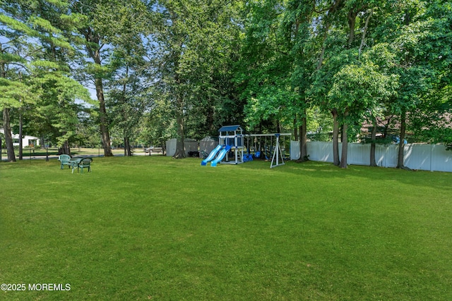 460 Runyan Ave, Deal, NJ 07723 - fenced backyard featuring a playground