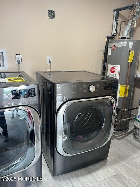 304 Palmer Ave, Neptune Township, NJ 07753 - laundry room featuring water heater and separate washer and dryer