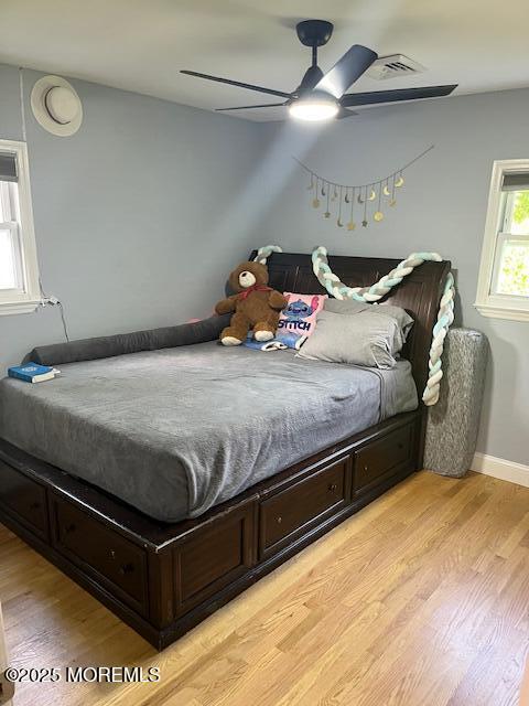 304 Palmer Ave, Neptune Township, NJ 07753 - bedroom with light wood-style floors and a ceiling fan