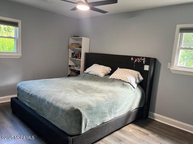 304 Palmer Ave, Neptune Township, NJ 07753 - bedroom with wood finished floors and ceiling fan