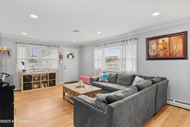 410 Jamaica Blvd, Toms River, NJ 08757 - living area with crown molding, light wood-style flooring, a baseboard radiator, and recessed lighting
