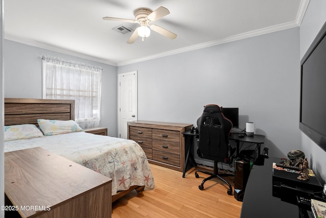 410 Jamaica Blvd, Toms River, NJ 08757 - bedroom with crown molding, light wood-style floors, a desk, and a ceiling fan