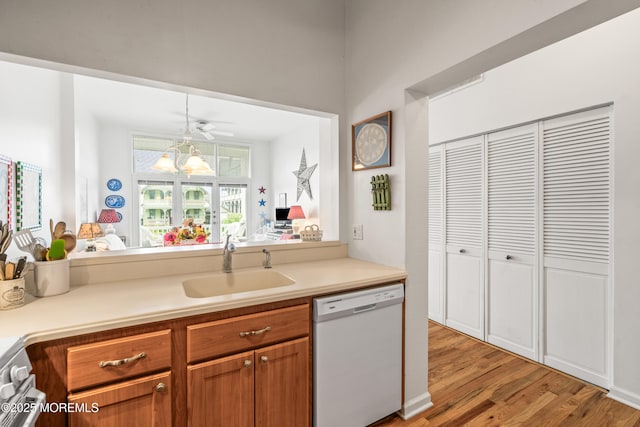 4 Ocean Ave Unit 5, Ocean Grove, NJ 07756 - kitchen featuring dishwasher, light wood finished floors, brown cabinetry, and light countertops