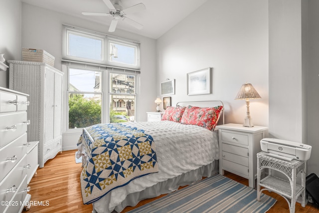 4 Ocean Ave Unit 5, Ocean Grove, NJ 07756 - bedroom featuring multiple windows, light wood finished floors, vaulted ceiling, and a ceiling fan