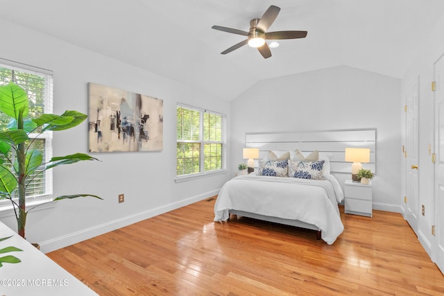 9 Nutmeg Ct, Tinton Falls, NJ 07753 - bedroom featuring multiple windows, light wood finished floors, vaulted ceiling, and ceiling fan