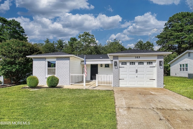 163 Courtshire Dr, Brick, NJ 08723 - view of front of house featuring driveway, an attached garage, a front yard, a porch, and brick siding
