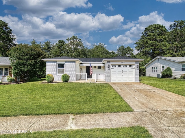 163 Courtshire Dr, Brick, NJ 08723 - single story home featuring an attached garage, concrete driveway, a front yard, and brick siding