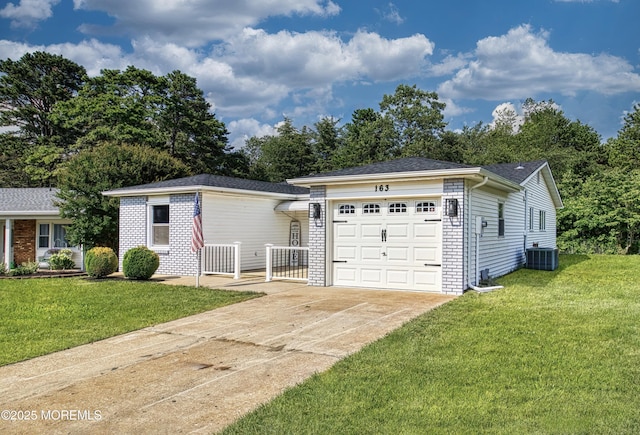 163 Courtshire Dr, Brick, NJ 08723 - ranch-style home featuring a garage, brick siding, concrete driveway, and a front yard