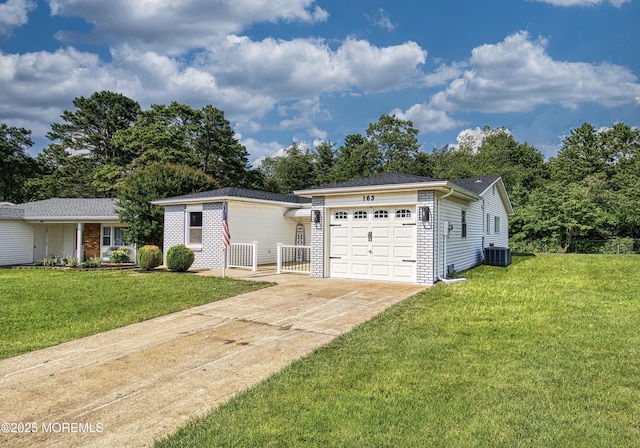 163 Courtshire Dr, Brick, NJ 08723 - ranch-style home featuring a garage, concrete driveway, a front lawn, and brick siding