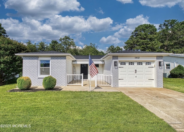 163 Courtshire Dr, Brick, NJ 08723 - ranch-style house featuring driveway, a front lawn, brick siding, and a garage