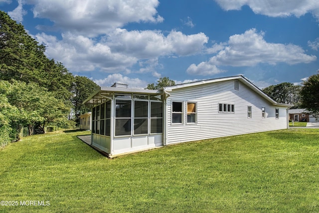 163 Courtshire Dr, Brick, NJ 08723 - back of house featuring a sunroom and a yard