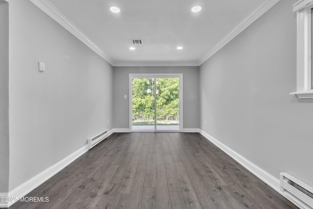 163 Courtshire Dr, Brick, NJ 08723 - unfurnished room with a baseboard heating unit, recessed lighting, dark wood finished floors, and crown molding