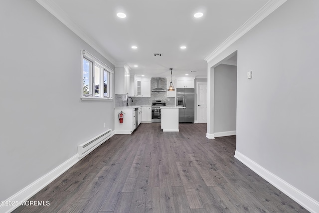 163 Courtshire Dr, Brick, NJ 08723 - unfurnished living room with baseboard heating, crown molding, recessed lighting, and dark wood finished floors