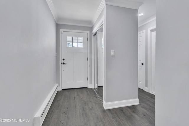 163 Courtshire Dr, Brick, NJ 08723 - foyer with a baseboard radiator, crown molding, and wood finished floors