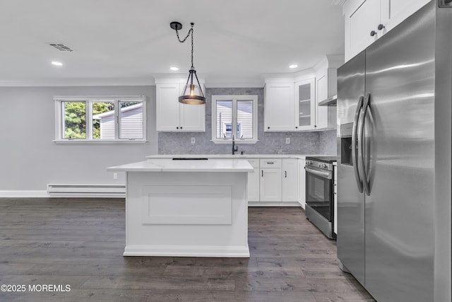 163 Courtshire Dr, Brick, NJ 08723 - kitchen featuring appliances with stainless steel finishes, a baseboard heating unit, plenty of natural light, light countertops, and recessed lighting