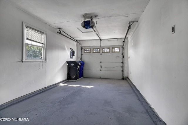 163 Courtshire Dr, Brick, NJ 08723 - garage featuring a garage door opener and electric panel