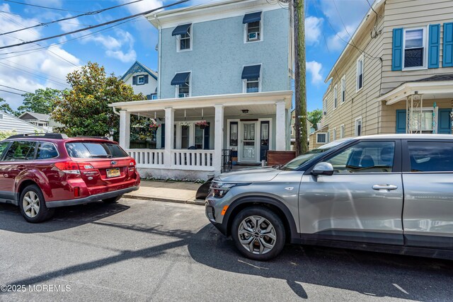 82 Mount Zion Way, Ocean Grove, NJ 07756 - view of front of property featuring covered porch and stucco siding