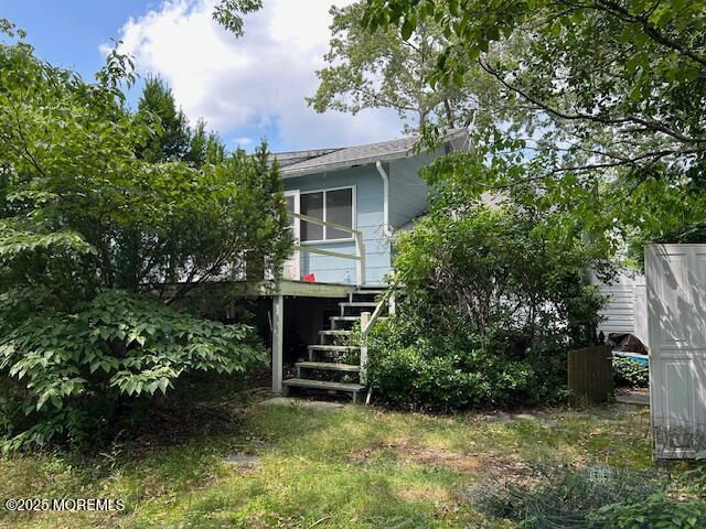 1599 Woodcrest Dr, Toms River, NJ 08753 - rear view of house with stairs