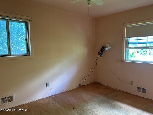 1599 Woodcrest Dr, Toms River, NJ 08753 - empty room featuring carpet floors and ceiling fan