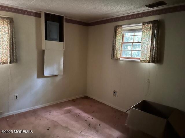 1599 Woodcrest Dr, Toms River, NJ 08753 - carpeted spare room with baseboards and a textured ceiling