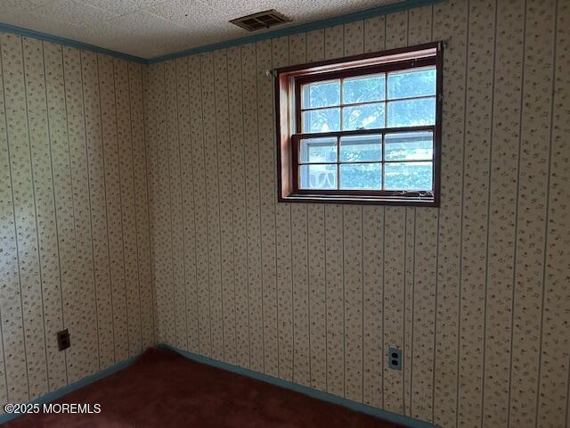 1599 Woodcrest Dr, Toms River, NJ 08753 - spare room with dark carpet
