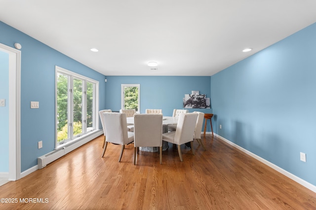 2262 Allenwood Rd, Allenwood, NJ 08720 - dining room featuring a baseboard heating unit, wood finished floors, and recessed lighting