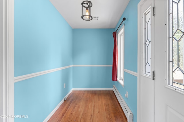 2262 Allenwood Rd, Allenwood, NJ 08720 - foyer entrance with baseboard heating and wood finished floors
