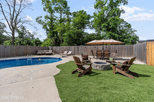 2262 Allenwood Rd, Allenwood, NJ 08720 - view of swimming pool featuring an outdoor living space with a fire pit, a patio, and a fenced backyard