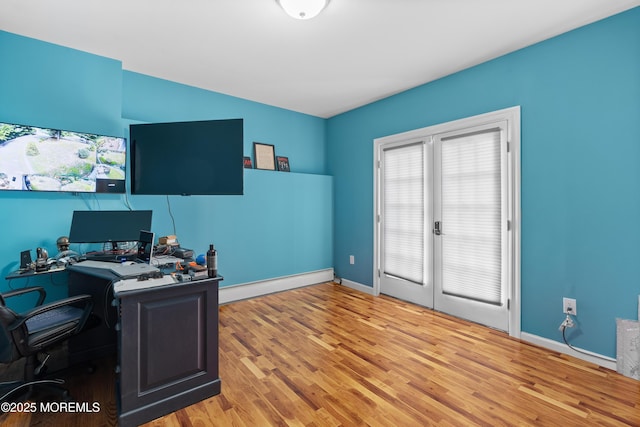 2262 Allenwood Rd, Allenwood, NJ 08720 - home office featuring a baseboard heating unit, plenty of natural light, and wood finished floors