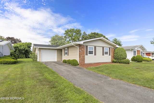 117 Clay Cir, Brick, NJ 08724 - single story home featuring a garage, asphalt driveway, a front yard, and brick siding