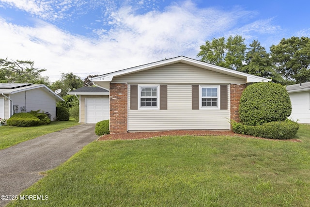117 Clay Cir, Brick, NJ 08724 - single story home featuring asphalt driveway, a garage, and a front lawn