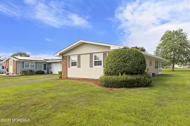 117 Clay Cir, Brick, NJ 08724 - view of front facade with a garage, driveway, a front lawn, and brick siding