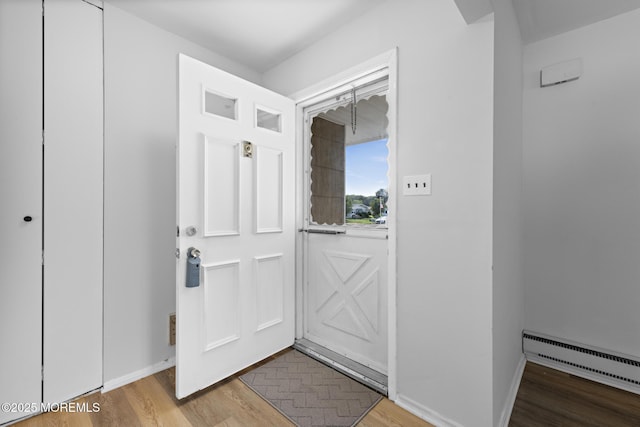 117 Clay Cir, Brick, NJ 08724 - foyer entrance featuring a baseboard radiator and light wood-type flooring